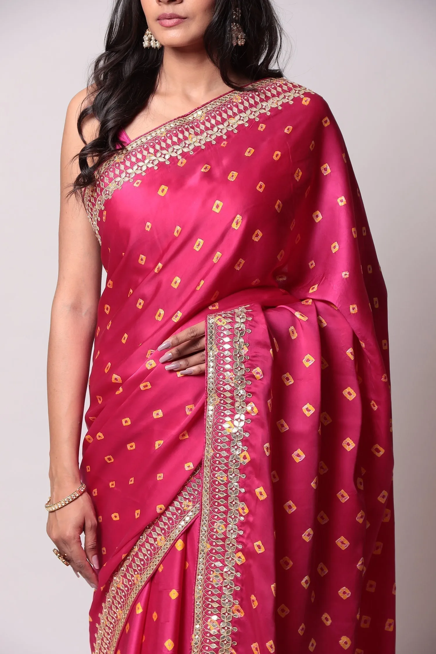 Bandhej Satin silk Saree with Gota Patti work.